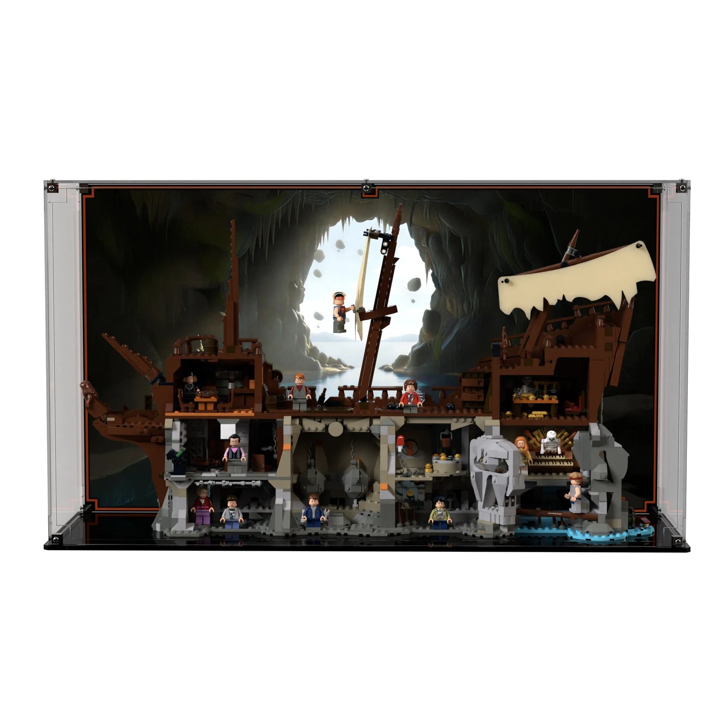 Brick In It premium acrylic display case for LEGO Ideas The Goonies (21363) set, printed coastal-cavern background view facing front.
