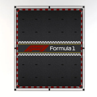 Empty wall-mounted F1 LEGO display case showing the printed background.